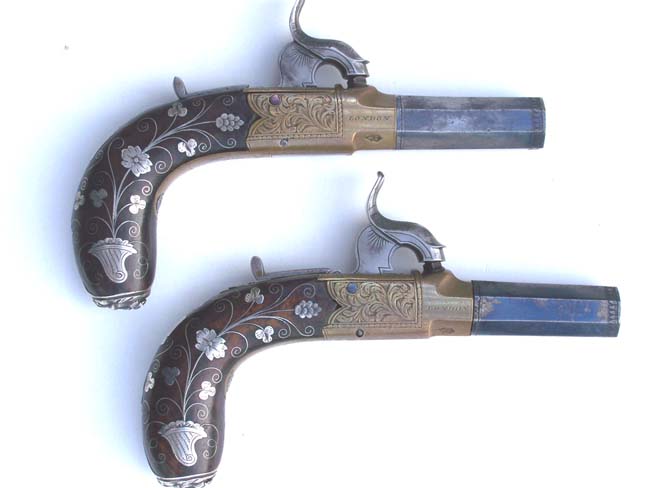 A Beautiful Pair of Silver Inlaid Percussion Pocket Pistols by Smith of London c. 1840